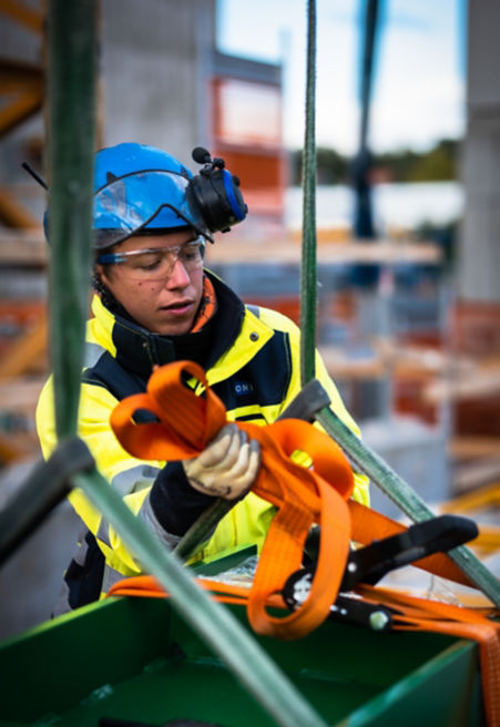 A KONE worker on a construction site.